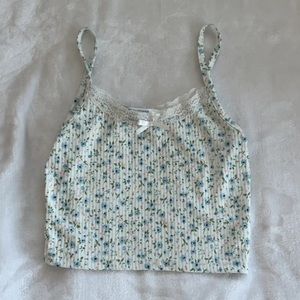 Cropped top with detail and a variety of colors! Good quality, rarely used.